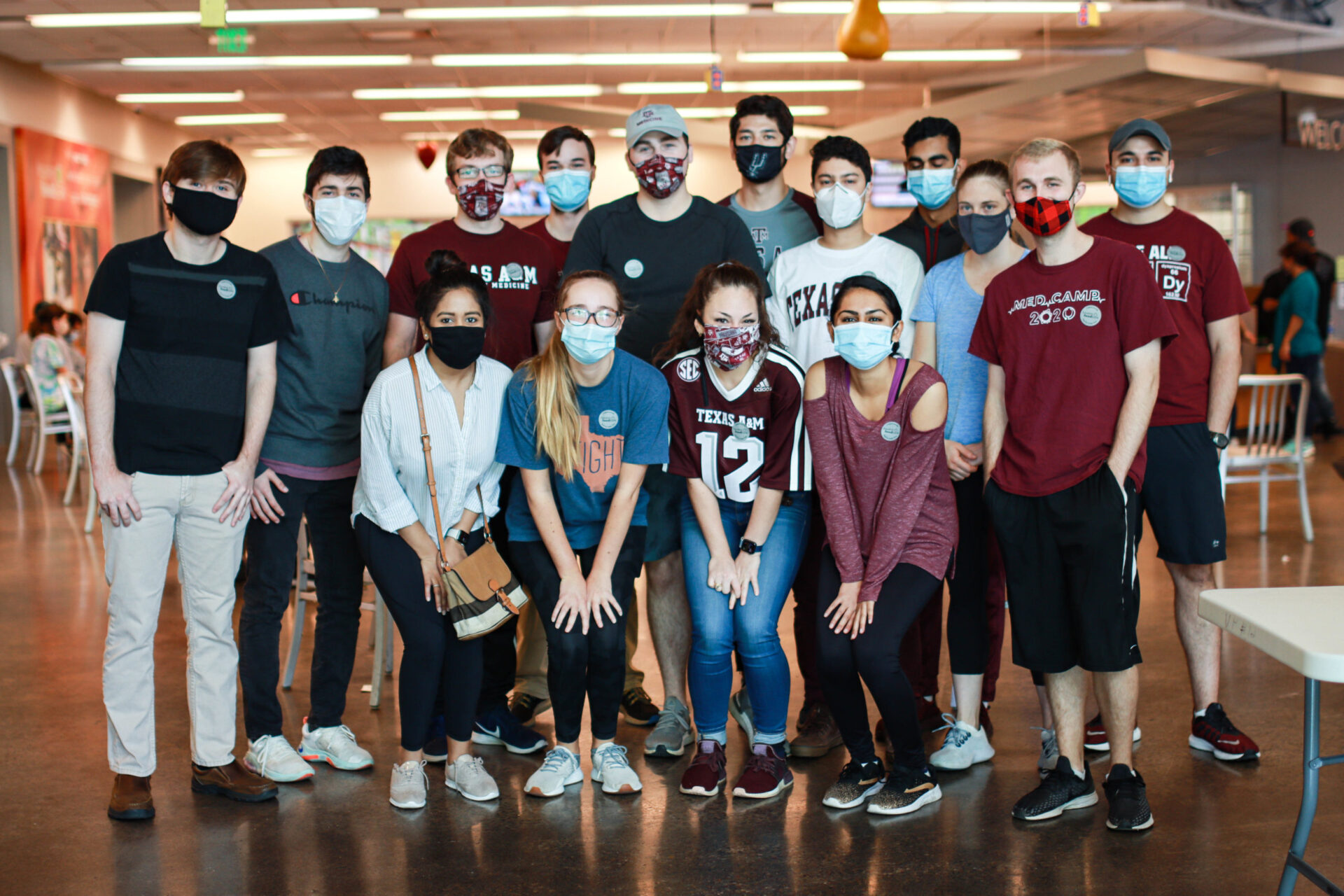 This photo was also taken during the class of 2024's volunteer event at the Houston Food Bank. Zhi requested for the group to wear Texas A&M maroon.