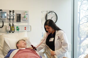 Student and mock patient during capstone week 