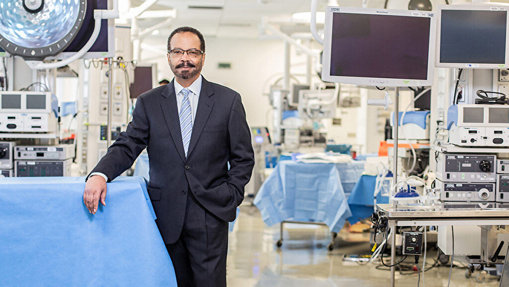 Dr. Roderic Pettigrew standing inside medical research facility