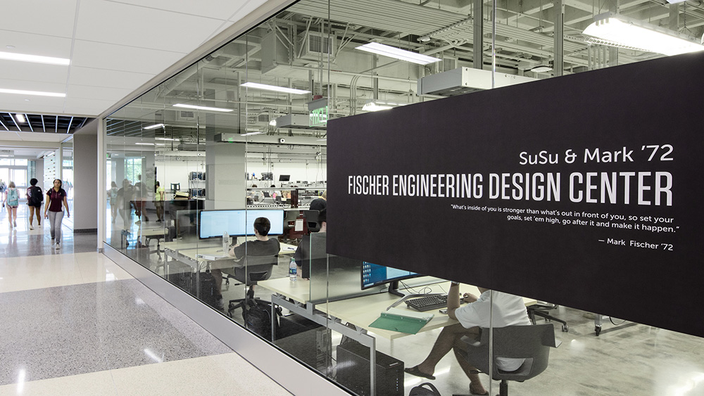 Exterior of sign and floor to ceiling glass walls at the EnMed Innovation Center